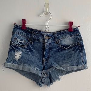 Low Rise Medium Wash Distressed Denim Shorts